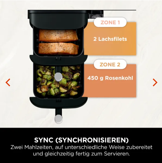 Airfryer im Einsatz auf weißer Küchenarbeitsfläche mit Gemüse